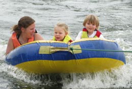 Our daughter tubing with two of the three grandkids