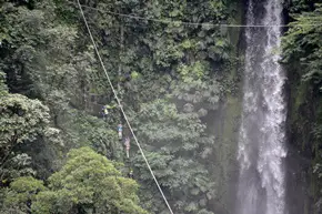 zip line and rappel next to a waterfall