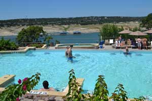 Pool at Lakeway Resort with view of Lake Travis