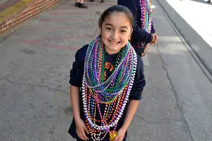 collecting beads at Mardi Gras
