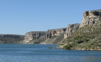 Blue water and tall bluffs of Lake Amistad