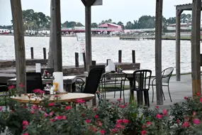 Sitting on the deck at Wolfies on Lake Conroe