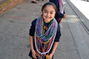 collecting beads at Mardi Gras